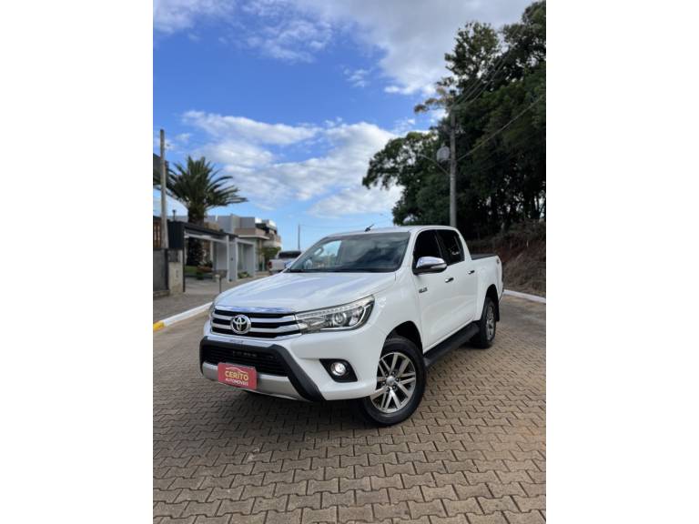 TOYOTA - HILUX - 2016/2016 - Branca - R$ 187.900,00